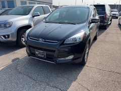 Used 2014 Ford Escape 4d SUV 4WD Titanium at Suburban Ford of Sterling Heights near Sterling Heights, MI
