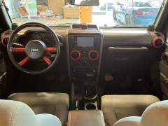 Used 2009 Jeep Wrangler Unlimited 4d Convertible 4WD Sahara at Suburban Ford of Sterling Heights near Sterling Heights, MI