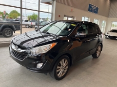 Used 2013 Hyundai Tucson FWD 4dr Auto Limited at Suburban Ford of Sterling Heights near Sterling Heights, MI