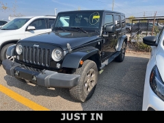 Used 2016 Jeep Wrangler Unlimited 4WD 4dr Sahara at Suburban Ford of Sterling Heights near Sterling Heights, MI