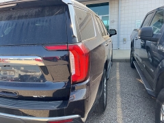 Used 2021 GMC Yukon 4WD 4dr SLT at Maxx Loans near St. Adrian, MI