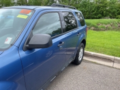 Used 2010 Ford Escape 4d SUV 4WD XLT at Suburban Ford of Sterling Heights near Sterling Heights, MI