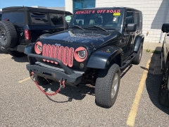 Used 2009 Jeep Wrangler Unlimited 4d Convertible 4WD Sahara at Suburban Ford of Sterling Heights near Sterling Heights, MI