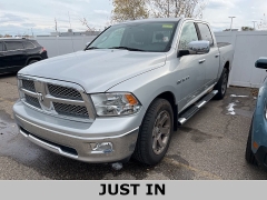 Used 2010  Dodge Ram 1500 4WD Crew Cab 140.5" Laramie at Maxx Loans near St. Adrian, MI