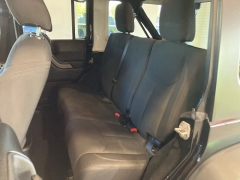 Used 2017  Jeep Wrangler Unlimited Willys Wheeler 4x4 at Maxx Loans near St. Adrian, MI