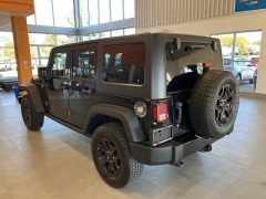 Used 2017  Jeep Wrangler Unlimited Willys Wheeler 4x4 at Maxx Loans near St. Adrian, MI