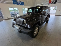 Used 2013  Jeep Wrangler Unlimited 4WD 4dr Sahara at Maxx Loans near St&period; Adrian&comma; MI