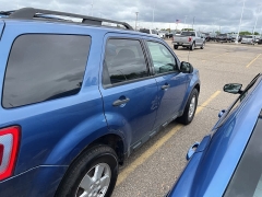 Used 2010 Ford Escape 4d SUV 4WD XLT at Suburban Ford of Sterling Heights near Sterling Heights, MI