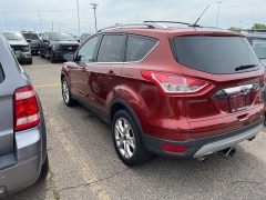 Used 2015 Ford Escape 4d SUV 4WD Titanium at Suburban Ford of Sterling Heights near Sterling Heights, MI