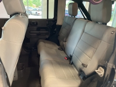 Used 2009 Jeep Wrangler Unlimited 4d Convertible 4WD Sahara at Suburban Ford of Sterling Heights near Sterling Heights, MI