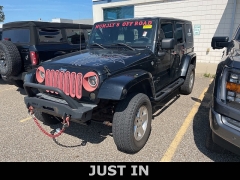 Used 2009 Jeep Wrangler Unlimited 4d Convertible 4WD Sahara at Suburban Ford of Sterling Heights near Sterling Heights, MI