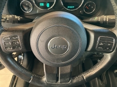 Used 2017  Jeep Wrangler Unlimited Willys Wheeler 4x4 at Maxx Loans near St. Adrian, MI