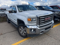 Used 2015 GMC Sierra 2500HD 4WD Crew Cab SLE at Suburban Ford of Sterling Heights near Sterling Heights, MI
