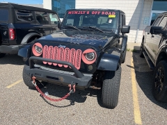 Used 2009 Jeep Wrangler Unlimited 4d Convertible 4WD Sahara at Suburban Ford of Sterling Heights near Sterling Heights, MI