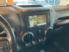 Used 2017  Jeep Wrangler Unlimited Willys Wheeler 4x4 at Maxx Loans near St. Adrian, MI