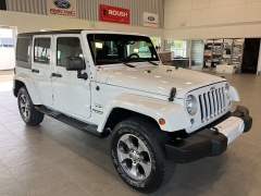 Used 2016 Jeep Wrangler Unlimited 4WD 4dr Sahara at Maxx Loans near St. Adrian, MI