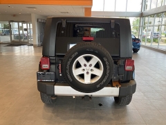 Used 2009 Jeep Wrangler Unlimited 4d Convertible 4WD Sahara at Suburban Ford of Sterling Heights near Sterling Heights, MI