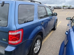 Used 2010 Ford Escape 4d SUV 4WD XLT at Suburban Ford of Sterling Heights near Sterling Heights, MI