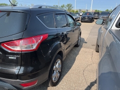 Used 2014 Ford Escape 4d SUV 4WD Titanium at Suburban Ford of Sterling Heights near Sterling Heights, MI
