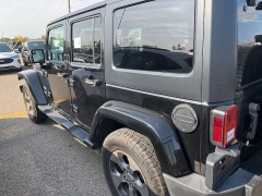 Used 2016 Jeep Wrangler Unlimited 4WD 4dr Sahara at Suburban Ford of Sterling Heights near Sterling Heights, MI