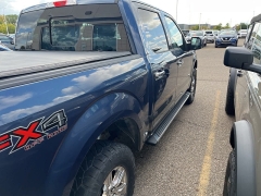 Used 2015 Ford F-150 4WD SuperCrew 145" XLT at Suburban Ford of Sterling Heights near Sterling Heights, MI