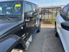 Used 2016 Jeep Wrangler Unlimited 4WD 4dr Sahara at Suburban Ford of Sterling Heights near Sterling Heights, MI