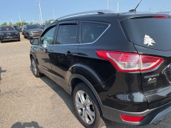 Used 2014 Ford Escape 4d SUV 4WD Titanium at Suburban Ford of Sterling Heights near Sterling Heights, MI