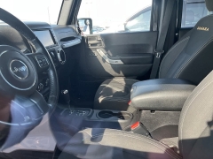 Used 2016 Jeep Wrangler Unlimited 4WD 4dr Sahara at Suburban Ford of Sterling Heights near Sterling Heights, MI