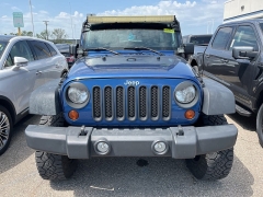 Used 2010 Jeep Wrangler Unlimited 4WD 4dr Sport at Suburban Ford of Sterling Heights near Sterling Heights, MI