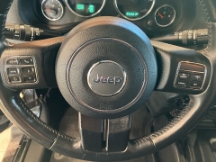 Used 2016  Jeep Wrangler Unlimited 4WD 4dr Sahara at Maxx Loans near St. Adrian, MI