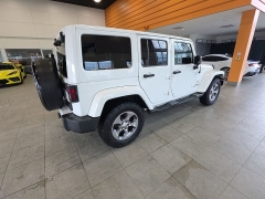 Used 2016  Jeep Wrangler Unlimited 4WD 4dr Sahara at Maxx Loans near St&period; Adrian&comma; MI