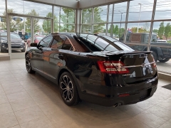 Used 2013 Ford Taurus 4d Sedan SHO AWD at Maxx Loans near ,