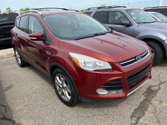 Used 2015 Ford Escape 4d SUV 4WD Titanium at Suburban Ford of Sterling Heights near Sterling Heights, MI
