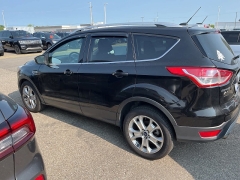 Used 2014 Ford Escape 4d SUV 4WD Titanium at Suburban Ford of Sterling Heights near Sterling Heights, MI