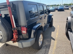 Used 2009 Jeep Wrangler Unlimited 4d Convertible 4WD Sahara at Suburban Ford of Sterling Heights near Sterling Heights, MI