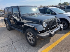 Used 2016 Jeep Wrangler Unlimited 4WD 4dr Sahara at Suburban Ford of Sterling Heights near Sterling Heights, MI