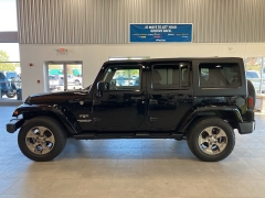 Used 2016  Jeep Wrangler Unlimited 4WD 4dr Sahara at Maxx Loans near St. Adrian, MI
