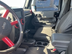 Used 2009 Jeep Wrangler Unlimited 4d Convertible 4WD Sahara at Suburban Ford of Sterling Heights near Sterling Heights, MI