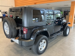 Used 2009 Jeep Wrangler Unlimited 4d Convertible 4WD Sahara at Suburban Ford of Sterling Heights near Sterling Heights, MI