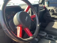 Used 2009 Jeep Wrangler Unlimited 4d Convertible 4WD Sahara at Suburban Ford of Sterling Heights near Sterling Heights, MI