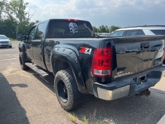 Used 2014 GMC Sierra 2500HD 4WD Crew Cab SLT at Maxx Loans near St. Adrian, MI