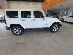 Used 2016  Jeep Wrangler Unlimited 4WD 4dr Sahara at Maxx Loans near St&period; Adrian&comma; MI