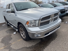 Used 2010  Dodge Ram 1500 4WD Crew Cab 140.5" Laramie at Maxx Loans near St. Adrian, MI