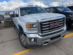 Used 2015 GMC Sierra 2500HD 4WD Crew Cab SLE at Suburban Ford of Sterling Heights near Sterling Heights, MI