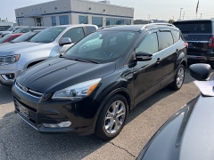 Used 2014 Ford Escape 4d SUV 4WD Titanium at Suburban Ford of Sterling Heights near Sterling Heights, MI