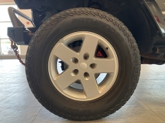 Used 2009 Jeep Wrangler Unlimited 4d Convertible 4WD Sahara at Suburban Ford of Sterling Heights near Sterling Heights, MI
