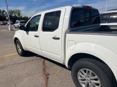 Used 2015 Nissan Frontier 2WD Crew Cab SWB Auto SV at Suburban Ford of Sterling Heights near Sterling Heights, MI