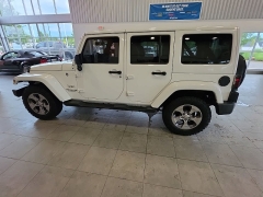 Used 2016  Jeep Wrangler Unlimited 4WD 4dr Sahara at Maxx Loans near St&period; Adrian&comma; MI
