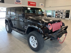 Used 2009 Jeep Wrangler Unlimited 4d Convertible 4WD Sahara at Suburban Ford of Sterling Heights near Sterling Heights, MI