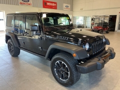 Used 2017  Jeep Wrangler Unlimited Willys Wheeler 4x4 at Maxx Loans near St. Adrian, MI